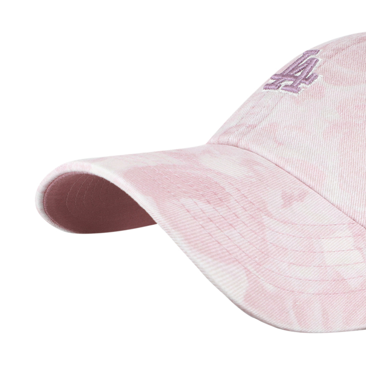 Gorra '47 Clean Up Gardenia Los Angeles Dodgers en malva, poliéster con estampado floral all over, curva sin estructura con strapback ajustable y logo de los Dodgers bordado al frente