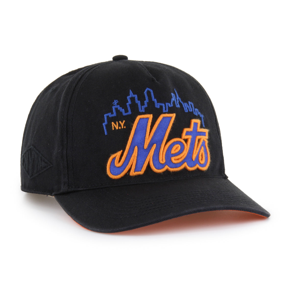 New York Mets MLB Charlton ’47 Hitch Relaxed Fit color Negro 00, visera negra semicurva, bordado frontal Mets azul con contorno naranja, silueta urbana azul e inscripción N.Y. naranja, bordado tonal lateral derecho, emblema ’47 naranja lateral izquierdo y ajuste snapback.